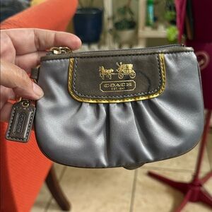 Coach Amanda satin wristlet in grey/silver,like new w/o tags.